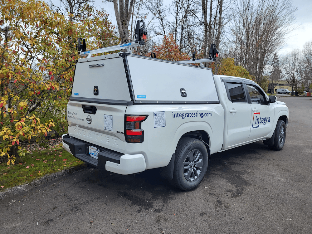 2025 Nissan Frontier with Adrian Steel Truck Cap