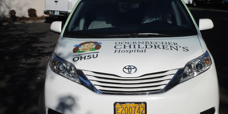 Toyota Sienna Full Body Graphics & Window Decals for Doernbecher Children’s Hospital Front of Vehicle