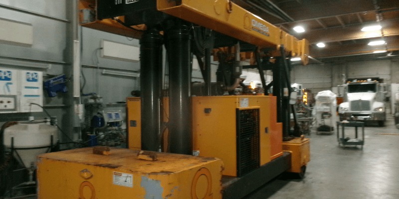 Omega Morgan Industrial Forklift Refinish and Branding Project Before Image