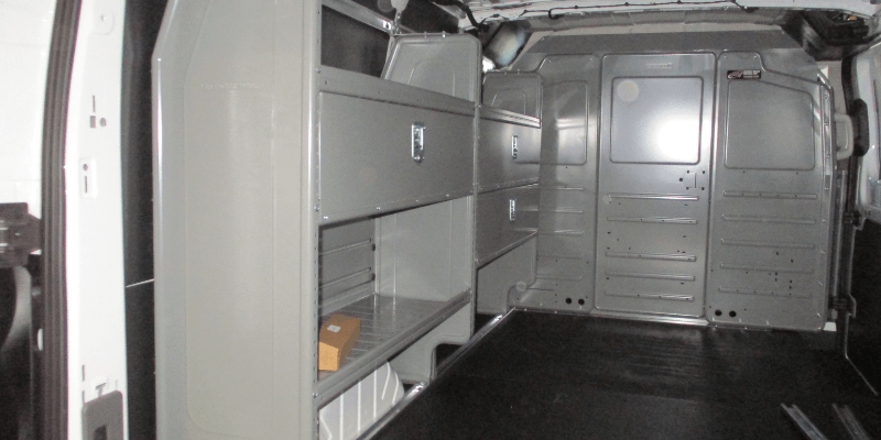 The Killers Ford Transit Cargo Van Upfit with Adrian Steel Shelving and Partition Inside View